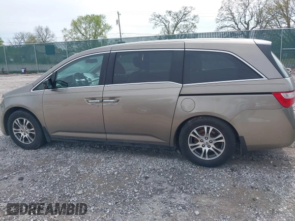 2013 Honda Odyssey EX-L with VIN 5FNRL5H65DB064238, listed as a IAAI auction lot 42050743 with 189,437 mi miles and . Bid and sale history available at carsss.com. Image 14.