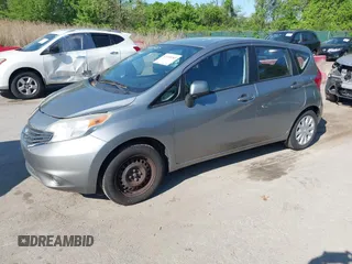 2014 Nissan Note SV with VIN 3N1CE2CP0EL404867, listed as a IAAI auction lot 42150285 with 124,370 mi miles and . Bid and sale history available at DreamBid. Image 2.