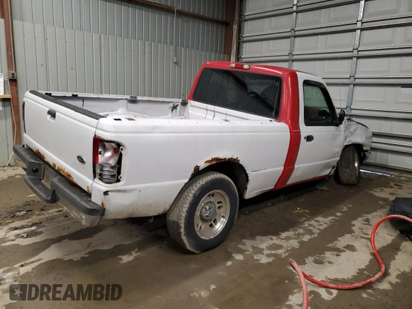 1999 Ford Ranger XL with VIN 1FTYR10C7XPB67854, listed as a Copart auction lot 86255294 with 169,102 mi miles and Salvage title. Bid and sale history available at DreamBid. Image 3.
