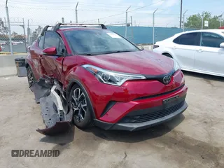2019 Toyota C-HR XLE z VIN JTNKHMBX9K1046003, wystawiony jako IAAI lot #42290041 z przebiegiem 51 810 mil mil oraz . Historia ofert i sprzedaży dostępna na DreamBid. Obrazek 1.