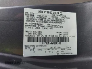 2009 Ford Focus SE z VIN 1FAHP35N59W180533, wystawiony jako IAAI lot #42443367 z przebiegiem 176 065 mil mil oraz . Historia ofert i sprzedaży dostępna na DreamBid. Obrazek 9.