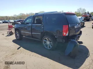 2014 Cadillac Escalade Platinum z VIN 1GYS4DEF9ER217707, wystawiony jako Copart lot #54745095 z przebiegiem 123 177 mil mil oraz Szkoda całkowita • Salvage title. Historia ofert i sprzedaży dostępna na DreamBid. Obrazek 2.