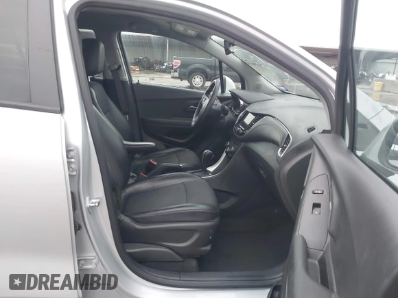 2021 Chevrolet Trax LT with VIN KL7CJPSM4MB374198, listed as a IAAI auction lot 41190073 with 68,733 mi miles and . Bid and sale history available at DreamBid. Image 5.