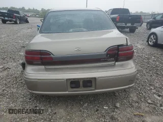 1997 Oldsmobile Cutlass GLS z VIN 1G3NG52MXV6316881, wystawiony jako Copart lot #55445305 z przebiegiem 101 640 mil mil oraz Szkody całkowita. Historia ofert i sprzedaży dostępna na DreamBid. Obrazek 6.