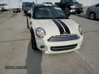 2013 MINI Coupe z VIN WMWSX1C56DT507407, wystawiony jako Copart lot #48176045 z przebiegiem 110 616 mil mil oraz Szkody całkowita. Historia ofert i sprzedaży dostępna na DreamBid. Obrazek 11.