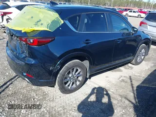 2024 Mazda CX-5 2.5 S Preferred Package with VIN JM3KFBCL6R0439880, listed as a IAAI auction lot 41472496 with 14,150 mi miles. Bid and sale history available at carsss.com. Image 4.