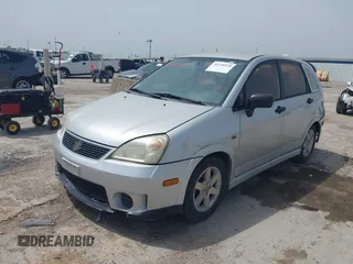 2006 Suzuki Aerio Premium z VIN JS2RC62H565354215, wystawiony jako IAAI lot #42256918 z przebiegiem 165 519 mil mil oraz . Historia ofert i sprzedaży dostępna na DreamBid. Obrazek 2.