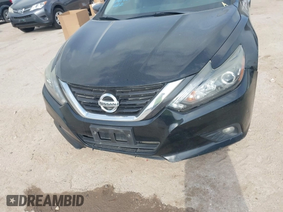 2017 Nissan Altima SR with VIN 1N4AL3AP0HC217024, listed as a IAAI auction lot 41729879 with 127,385 mi miles and . Bid and sale history available at carsss.com. Image 12.