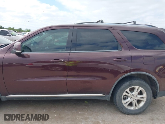 2012 Dodge Durango Crew with VIN 1C4RDHDG7CC144357, listed as a IAAI auction lot 42019204 with 174,408 mi miles and . Bid and sale history available at DreamBid. Image 14.