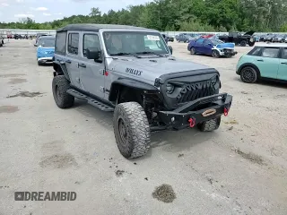 2020 Jeep Wrangler Unlimited Willys z VIN 1C4HJXDG5LW216718, wystawiony jako Copart lot #53144705 z przebiegiem 27 932 mil mil oraz Czysty tytuł • Clean title. Historia ofert i sprzedaży dostępna na DreamBid. Obrazek 14.