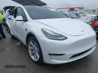 2021 Tesla Model Y Long Range with VIN 5YJYGAEE2MF260142, listed as a IAAI auction lot 41808666 with 87,316 mi miles and . Bid and sale history available at DreamBid. Image 1.