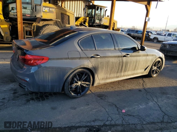 2019 BMW 5 Series M550i xDrive with VIN WBAJB9C55KB288709, listed as a Copart auction lot 46590735 with 58,256 mi miles and Salvage title. Bid and sale history available at DreamBid. Image 3.