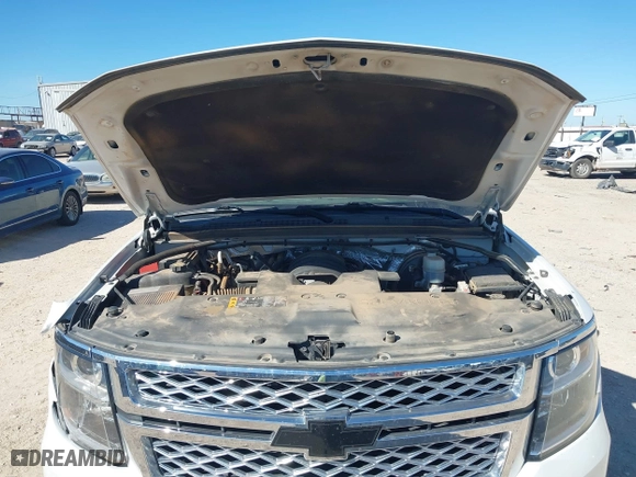 2018 Chevrolet Tahoe LT with VIN 1GNSCBKC8JR128476, listed as a IAAI auction lot 41447799 with 105,209 mi miles. Bid and sale history available at carsss.com. Image 10.