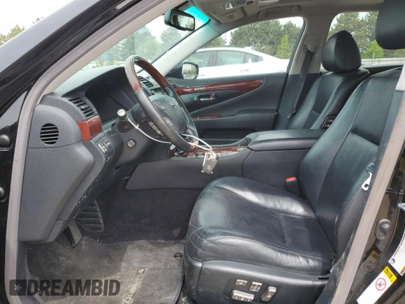2009 Lexus LS 460 with VIN JTHCL46F195002703, listed as a Copart auction lot 54679515 with 222,391 mi miles and Salvage title. Bid and sale history available at DreamBid. Image 7.