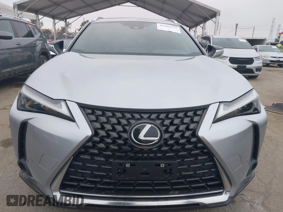 2023 Lexus UX 250h with VIN JTHX6JBH6P2143926, listed as a IAAI auction lot 42180779 with 65,106 mi miles and . Bid and sale history available at DreamBid. Image 13.