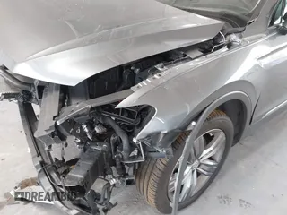 2020 Volkswagen Tiguan SE z VIN 3VV3B7AX0LM007612, wystawiony jako IAAI lot #42275320 z przebiegiem 44 254 mil mil oraz . Historia ofert i sprzedaży dostępna na DreamBid. Obrazek 6.