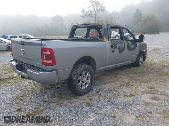 2023 Ram 2500 Laramie z VIN 3C6UR5FL7PG513099, wystawiony jako IAAI lot #41882148 z przebiegiem Nie podano mil oraz . Historia ofert i sprzedaży dostępna na DreamBid. Obrazek 4.