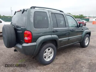 2002 Jeep Liberty Limited z VIN 1J4GL58K12W213087, wystawiony jako IAAI lot #42196895 z przebiegiem 85 110 mil mil oraz . Historia ofert i sprzedaży dostępna na DreamBid. Obrazek 4.