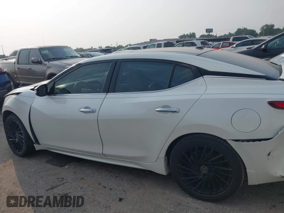 2016 Nissan Maxima SV with VIN 1N4AA6AP4GC421749, listed as a IAAI auction lot 42318579 with 120,669 mi miles and . Bid and sale history available at DreamBid. Image 13.