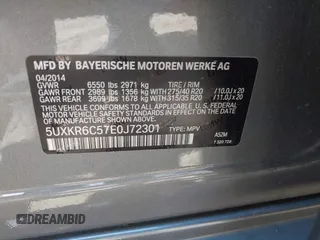 2014 BMW X5 xDrive50i with VIN 5UXKR6C57E0J72301, listed as a IAAI auction lot 39379887 with 117,012 mi miles. Bid and sale history available at carsss.com. Image 9.
