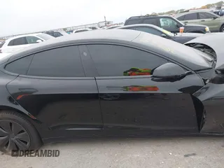 2022 Tesla Model S Plaid with VIN 5YJSA1E65NF484149, listed as a IAAI auction lot 40937538 with 11,459 mi miles and . Bid and sale history available at DreamBid. Image 12.