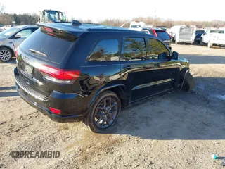 2021 Jeep Grand Cherokee Limited z VIN 1C4RJFBG8MC536748, wystawiony jako IAAI lot #41820268 z przebiegiem 49 882 mil mil oraz . Historia ofert i sprzedaży dostępna na DreamBid. Obrazek 4.