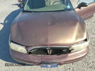 1999 Buick Century Custom with VIN 2G4WS52M3X1602094, listed as a Copart auction lot 75124974 with 166,972 mi miles and Salvage Title. Bid and sale history available at carsss.com. Image 11.