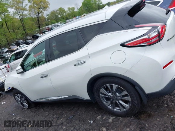 2016 Nissan Murano Platinum with VIN 5N1AZ2MG5GN126361, listed as a IAAI auction lot 41973077 with 124,624 mi miles and . Bid and sale history available at DreamBid. Image 14.