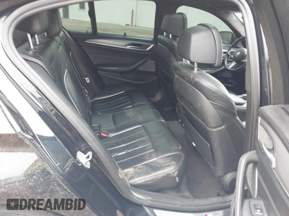 2018 BMW 5 Series M550i xDrive с VIN WBAJB9C53JB286746, выставлен на аукционе IAAI как лот 42303002 с пробегом 81 039 миль миль и . История ставок и продаж доступна на DreamBid. Изображение 8.