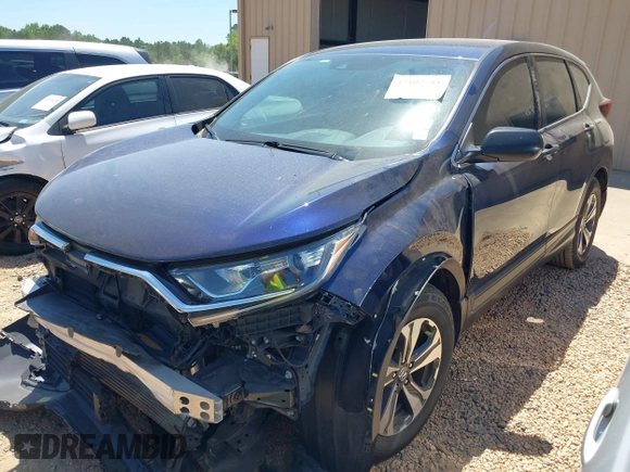 2020 Honda CR-V LX with VIN 2HKRW1H22LH412512, listed as a IAAI auction lot 42107381 with 60,062 mi miles and . Bid and sale history available at DreamBid. Image 2.