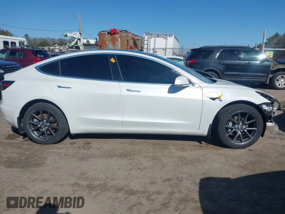 2020 Tesla Model 3 Long Range with VIN 5YJ3E1EBXLF636963, listed as a IAAI auction lot 41826249 with 68,085 mi miles. Bid and sale history available at carsss.com. Image 14.