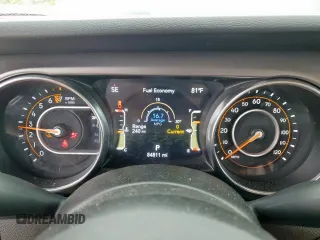 2021 Jeep Gladiator Willys с VIN 1C6HJTAG9ML606731, выставлен на аукционе Copart как лот 59873205 с пробегом 84 811 миль миль и Списание • Salvage title. История ставок и продаж доступна на DreamBid. Изображение 9.
