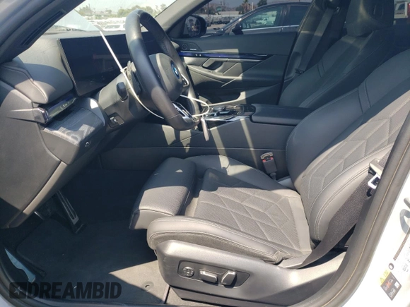 2024 BMW i5 eDrive40 with VIN WBY33FK09RCR17369, listed as a Copart auction lot 65018825 with 3,853 mi miles and Clean title. Bid and sale history available at DreamBid. Image 7.