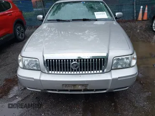 2010 Mercury Grand Marquis LS z VIN 2MEBM7FV5AX606629, wystawiony jako IAAI lot #42345444 z przebiegiem 66 600 mil mil oraz . Historia ofert i sprzedaży dostępna na DreamBid. Obrazek 6.
