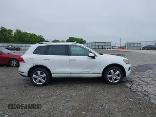 2012 Volkswagen Touareg Sport z VIN WVGEF9BP0CD006506, wystawiony jako IAAI lot #42355432 z przebiegiem 175 346 mil mil oraz . Historia ofert i sprzedaży dostępna na DreamBid. Obrazek 13.