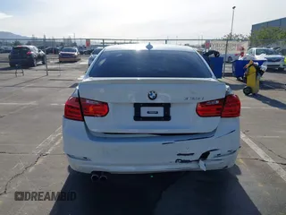 2015 BMW 3 Series 328i with VIN WBA3C1C52FK119339, listed as a IAAI auction lot 41549876 with 148,347 mi miles and . Bid and sale history available at carsss.com. Image 16.