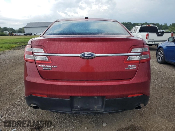 2015 Ford Taurus SEL with VIN 1FAHP2E88FG166961, listed as a Copart auction lot 61429255 with 124,780 mi miles and Salvage title. Bid and sale history available at DreamBid. Image 6.