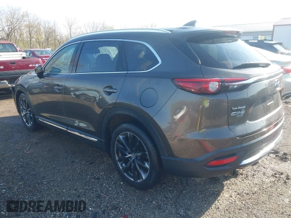 2016 Mazda CX-9 Grand Touring z VIN JM3TCBDY3G0104001, wystawiony jako IAAI lot #41961054 z przebiegiem 77 057 mil mil oraz . Historia ofert i sprzedaży dostępna na DreamBid. Obrazek 3.