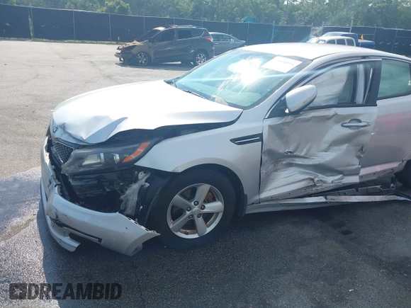 2015 Kia Optima LX with VIN 5XXGM4A75FG378795, listed as a IAAI auction lot 42604014 with 57,199 mi miles and . Bid and sale history available at DreamBid. Image 6.