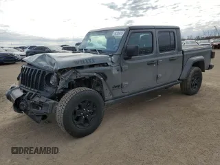 2023 Jeep Gladiator Willys z VIN 1C6HJTAG0PL507803, wystawiony jako Copart lot #48526875 z przebiegiem 51 811 mil mil oraz Czysty tytuł • Clean title. Historia ofert i sprzedaży dostępna na DreamBid. Obrazek 1.