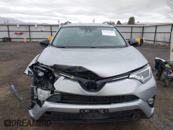 2018 Toyota RAV4 LE with VIN 2T3BFREV9JW724606, listed as a IAAI auction lot 41862028 with 98,590 mi miles. Bid and sale history available at carsss.com. Image 12.