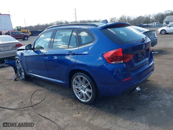2015 BMW X1 sDrive28i with VIN WBAVM1C58FV314947, listed as a IAAI auction lot 41874472 with 128,271 mi miles. Bid and sale history available at carsss.com. Image 3.