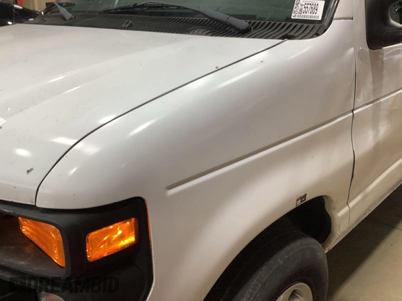 2013 Ford Econoline Cargo Commercial with VIN 1FTNE1EW9DDA61968, listed as a IAAI auction lot 42643038 with 121,719 mi miles and . Bid and sale history available at DreamBid. Image 22.
