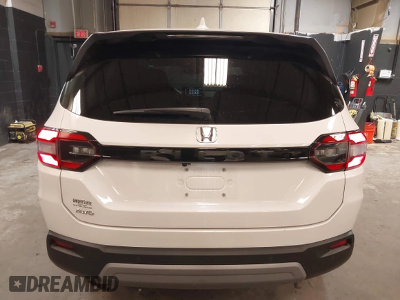 2023 Honda Pilot EX-L z VIN 5FNYG1H5XPB043275, wystawiony jako IAAI lot #41747522 z przebiegiem 18 865 mil mil oraz . Historia ofert i sprzedaży dostępna na DreamBid. Obrazek 16.