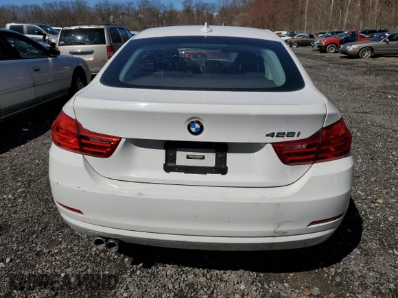 2015 BMW 4 Series 428i z VIN WBA4A9C53FGL85500, wystawiony jako Copart lot #50004575 z przebiegiem 129 018 mil mil oraz Szkoda całkowita • Salvage title. Historia ofert i sprzedaży dostępna na DreamBid. Obrazek 6.