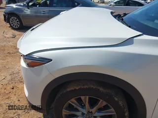 2021 Mazda CX-5 Grand Touring with VIN JM3KFBDM3M0493752, listed as a IAAI auction lot 42456854 with 35,122 mi miles and . Bid and sale history available at DreamBid. Image 19.