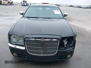 2005 Chrysler 300 with VIN 2C3AA63H45H674987, listed as a IAAI auction lot 41560730 with 101,659 mi miles. Bid and sale history available at carsss.com. Image 6.