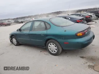 1997 Ford Taurus G with VIN 1FALP51U2VG299048, listed as a Copart auction lot 85742504 with 123,356 mi miles and Salvage Title. Bid and sale history available at carsss.com. Image 2.