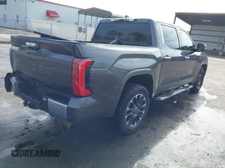 2022 Toyota Tundra Limited with VIN 5TFJA5AB7NX011302, listed as a IAAI auction lot 41400983 with 93,747 mi miles and . Bid and sale history available at DreamBid. Image 4.