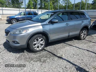 2014 Mazda CX-9 Touring с VIN JM3TB2CA6E0441458, выставлен на аукционе Copart как лот 60516075 с пробегом 87 564 миль миль и Списание • Salvage title. История ставок и продаж доступна на DreamBid. Изображение 1.